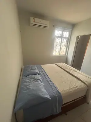 Uma cama ou camas num quarto em GT Hostel