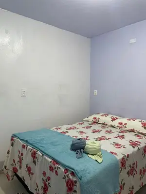 Uma cama ou camas num quarto em Pousada Quinta das Flores