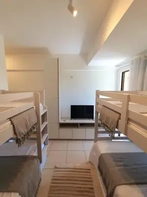 Uma cama ou camas num quarto em Beach Place Resort