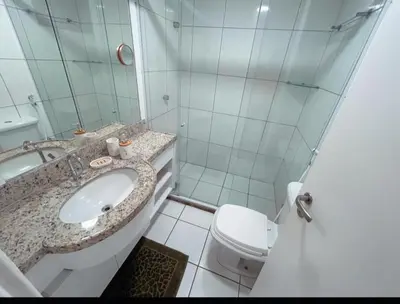 Uma casa de banho em Beach Place Resort