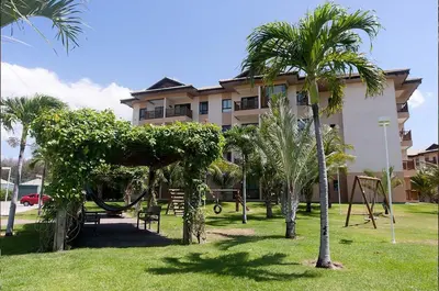 Um jardim no exterior de VG Sun Cumbuco Delicinha de Apto para 4 pessoas
