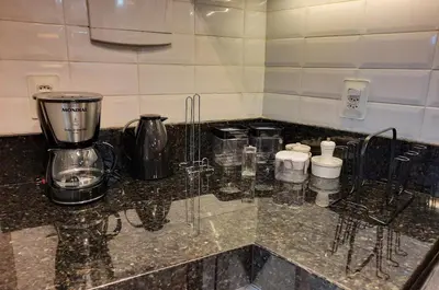A cozinha ou kitchenette de Flat Luxo 4 Pessoas 500m Praia Meireles Compact