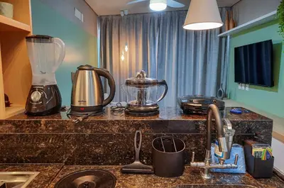 A cozinha ou kitchenette de Flat Luxo 4 Pessoas 500m Praia Meireles Compact