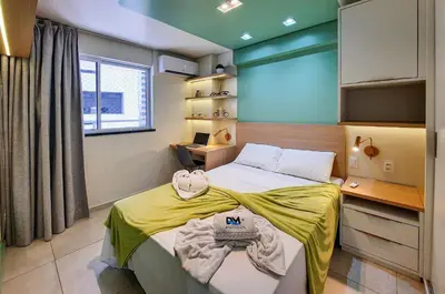 Uma cama ou camas num quarto em Flat Luxo 4 Pessoas 500m Praia Meireles Compact