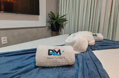 Uma cama ou camas num quarto em Luxuoso e Moderno Studio One Milenio no Cocó