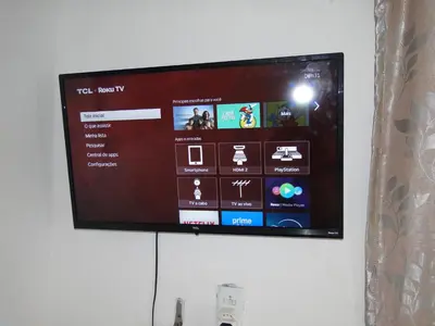 Uma televisão e/ou sistema de entretenimento em Lounge Taíba Casa com Vista para o mar a 3 min da Praia Pet-Friendly