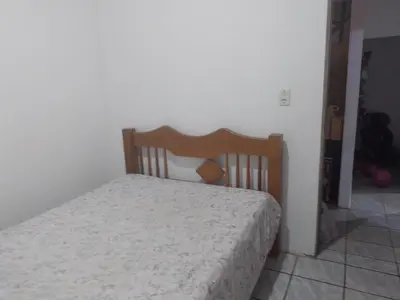 Uma cama ou camas num quarto em Chácara da Lilian