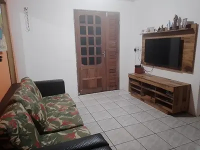 Uma televisão e/ou sistema de entretenimento em Chácara da Lilian