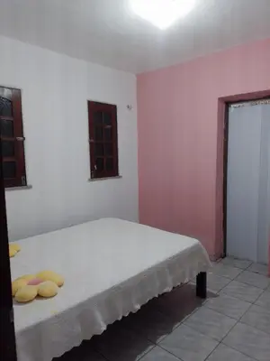 Uma cama ou camas num quarto em Chácara da Lilian
