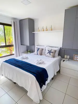 Uma cama ou camas num quarto em Vgsun Cumbuco 211