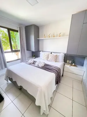 Uma cama ou camas num quarto em Vgsun Cumbuco 211