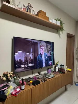 Uma televisão e/ou sistema de entretenimento em Suites em mansão