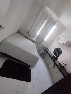 Uma cama ou camas num quarto em Paraíso em Aquiraz - Paz, Sol e Mar ao seu Alcance