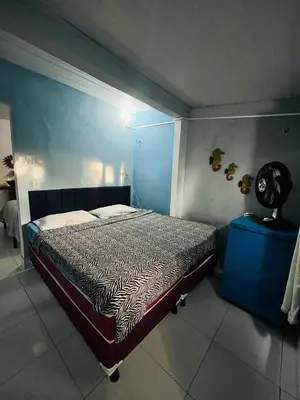 Uma cama ou camas num quarto em Blue Day
