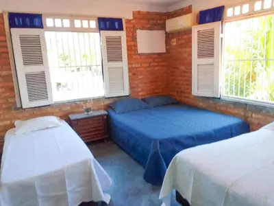 Uma cama ou camas num quarto em Wind Villa Cumbuco - Casa