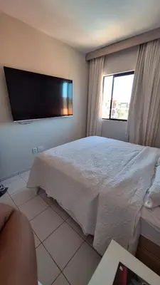 Uma cama ou camas num quarto em Apt moderno Porto das Dunas