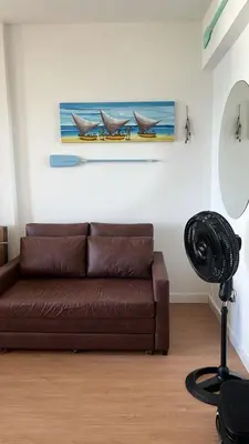 Uma área de estar em Apartamento com vista Beira-Mar