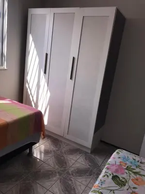 Uma cama ou camas num quarto em Condomínio Vista Mar