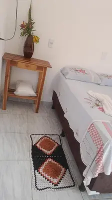 Uma cama ou camas num quarto em Econômico Suíte Standard Vila Jeri