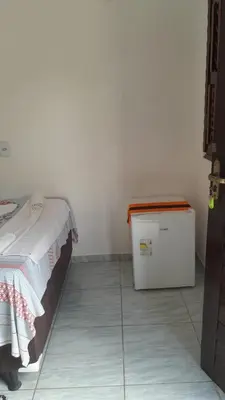 Uma cama ou camas num quarto em Econômico Suíte Standard Vila Jeri
