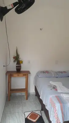 Uma cama ou camas num quarto em Econômico Suíte Standard Vila Jeri