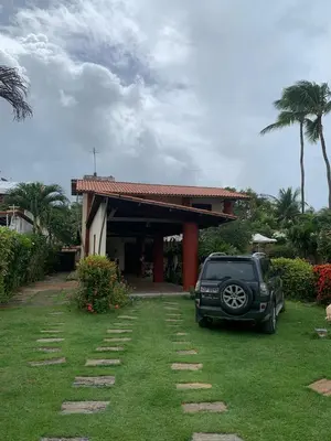 Um jardim no exterior de Casa acolhedora no Cumbuco
