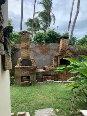 Um jardim no exterior de Casa acolhedora no Cumbuco