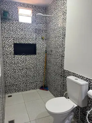 Uma casa de banho em Suítes Nativa