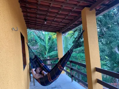 Uma varanda ou terraço em Chalé Pássaros - Guaramiranga