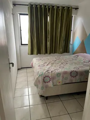 Uma cama ou camas num quarto em Flat Dragão do Mar
