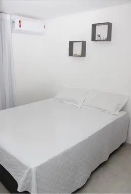 Uma cama ou camas num quarto em Apartamento Meireles Praia de Iracema e Beira mar