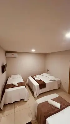 Uma cama ou camas num quarto em Pousada Iracema Charme