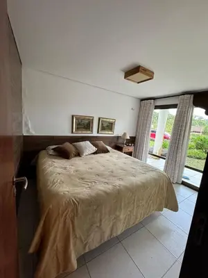 Uma cama ou camas num quarto em Casa na Serra - Monte Flor