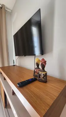 Uma televisão e/ou sistema de entretenimento em Mirante Clube - Praia do Futuro