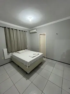 Uma cama ou camas num quarto em Seller House