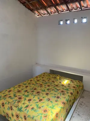 Uma cama ou camas num quarto em Casa Galeno