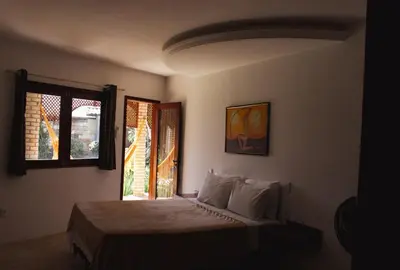 Uma cama ou camas num quarto em Villa Veríssimo Paracuru