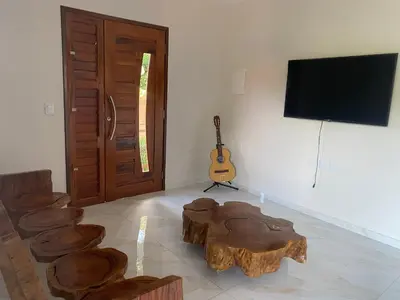 Uma televisão e/ou sistema de entretenimento em Chalé Bella Vista