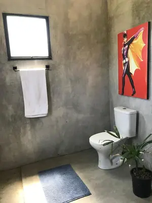 Uma casa de banho em Vila Angatu