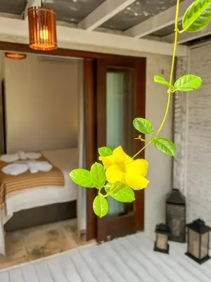 Uma cama ou camas num quarto em Uba Village Icaraizinho