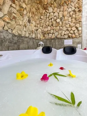Uma cama ou camas num quarto em Uba Village Icaraizinho