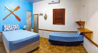 Uma cama ou camas num quarto em Casa Rumaré