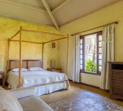 Uma cama ou camas num quarto em Casa de Praia com Piscina - Guajiru - Flecheiras