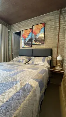 Uma cama ou camas num quarto em Praiana house