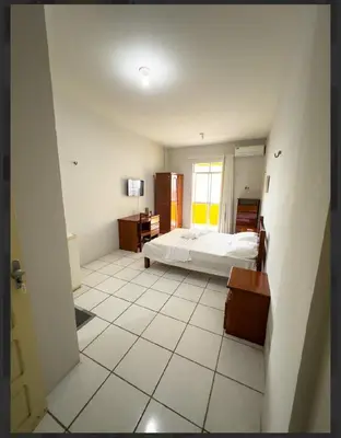 Uma cama ou camas num quarto em Hotel e Flat Sobral Mundi