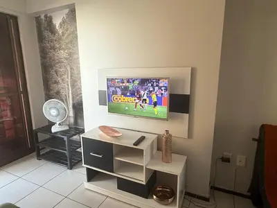 Uma televisão e/ou sistema de entretenimento em Atlantic Ocean Residence Sea