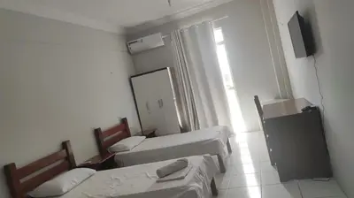 Uma televisão e/ou sistema de entretenimento em Hotel e Flat Sobral Mundi