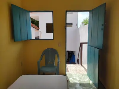 Uma cama ou camas num quarto em Residencial dos Freitas