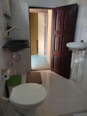 Uma cama ou camas num quarto em Residencial dos Freitas