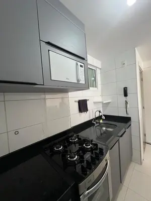 A cozinha ou kitchenette de Apartamento a dois passos da beira mar